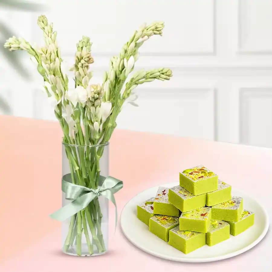 Pista Barfi from Karachi Sweet Mart with Rajnigandha Stems in a Glass Vase
