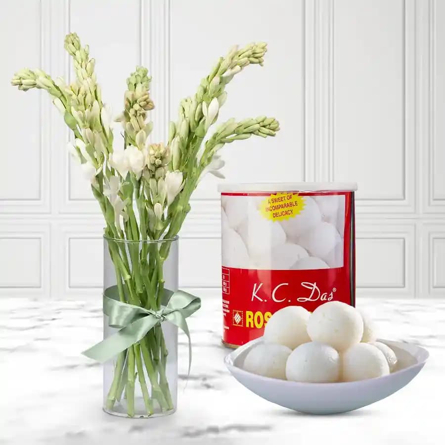 Canned Rossogolla from K.C.Das with Rajnigandha Stems