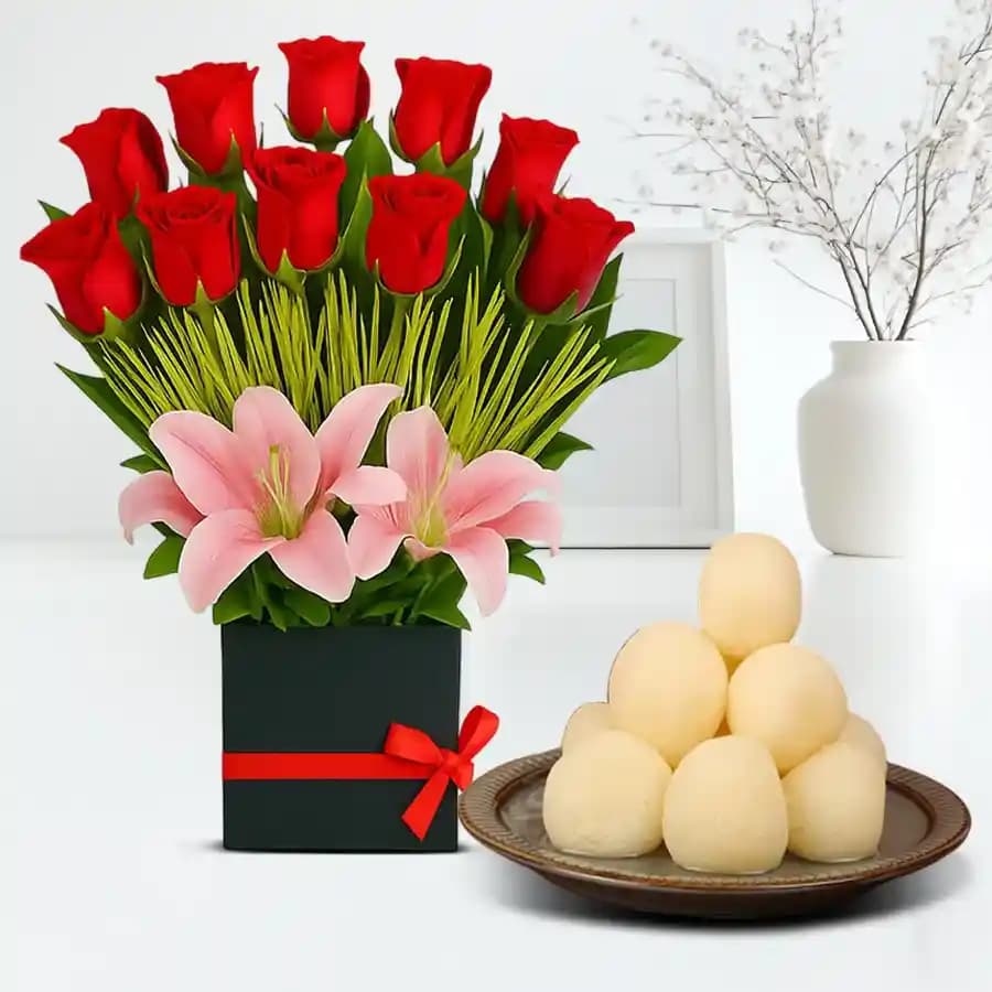 Canned Rossogolla from K.C.Das with Designer Flower Arrangement