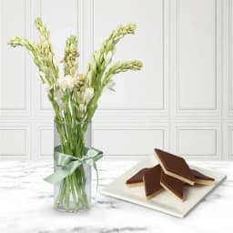 Chocolate Katli from Mithas Delicious Sweets with Rajanigandha Stems in Glass Vase 1