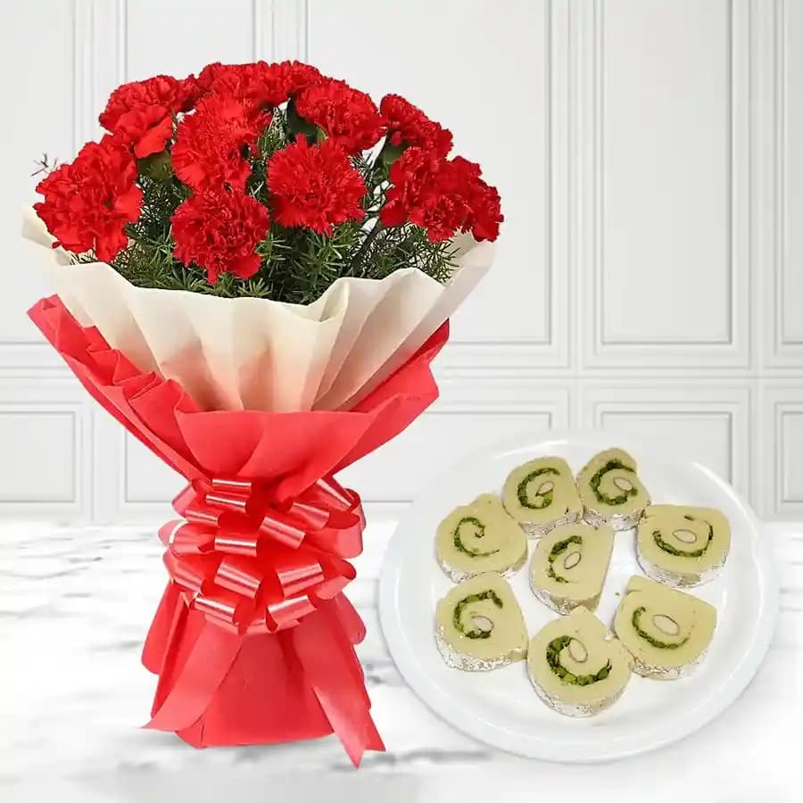 Kaju Cake from Mithas Delicious Sweets with Red Carnation Tissue Wrapped Bouquet