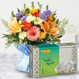 Beautiful fresh Seasonal Flower and delectable Kaju Barfi 1