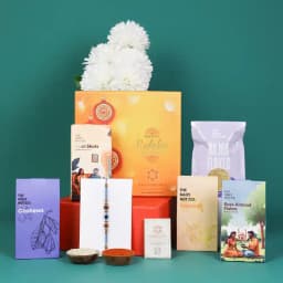 Caring Rakhi & Gourmet Nut Medley Set 1