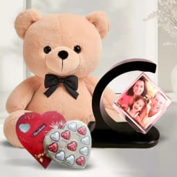 Ravishing Valentine Gift of Personalized Photo Revolving Stand with Teddy n Chocolate 1