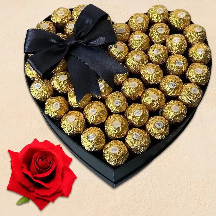 Charismatic Chocolate Day Gift of Heart Arrangement of Ferrero Rocher with Rose