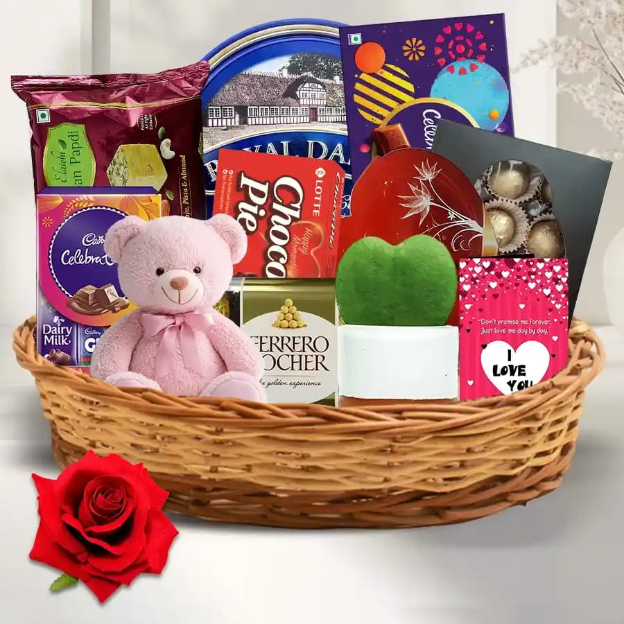 Enthralling Chocolate Assortments Gift Basket with Rose Teddy N Plant