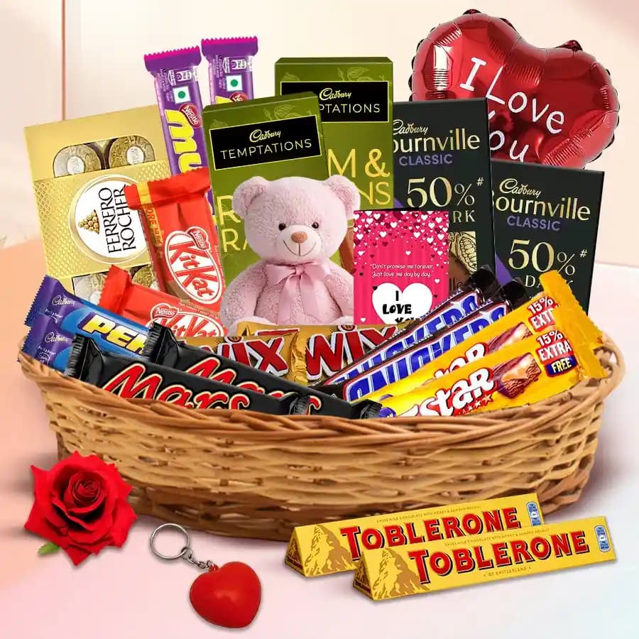 Exceptional Gift Basket of Assorted Chocolates with V Day Essentials