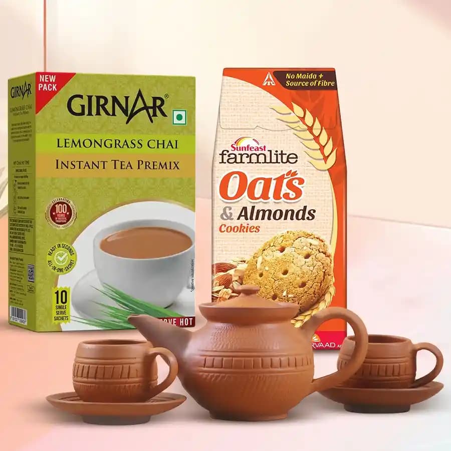 Superb Girnar Lemongrass Tea Hamper with Terracota Tea Set