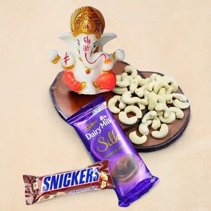 Exquisite Marble Ganesha Sculpture with Gourmet Treats