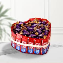 Superb Heart Shape Bouquet of Kitkat n Cadbury Candies 1