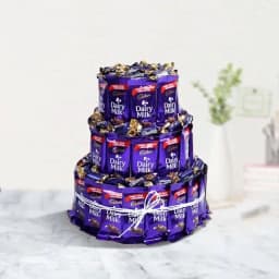 Alluring Cadbury Chocolate N Eclairs 3 Tier Arrangement 1