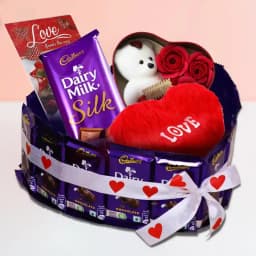 Splendid Combo of Hearty Cushion n Teddy with Mixed Chocolates n Art Roses with Love Card 1