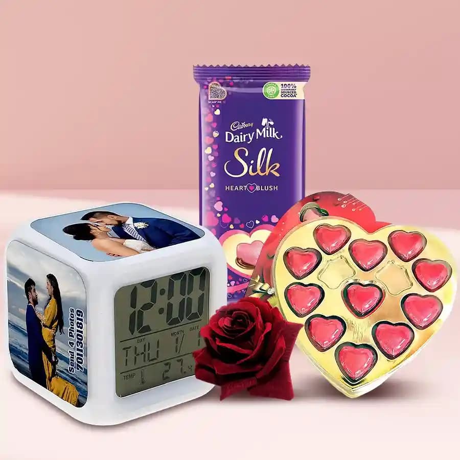 Exciting Gift of Personalized Photo Clock with Heart Shape Chocolates n Roses