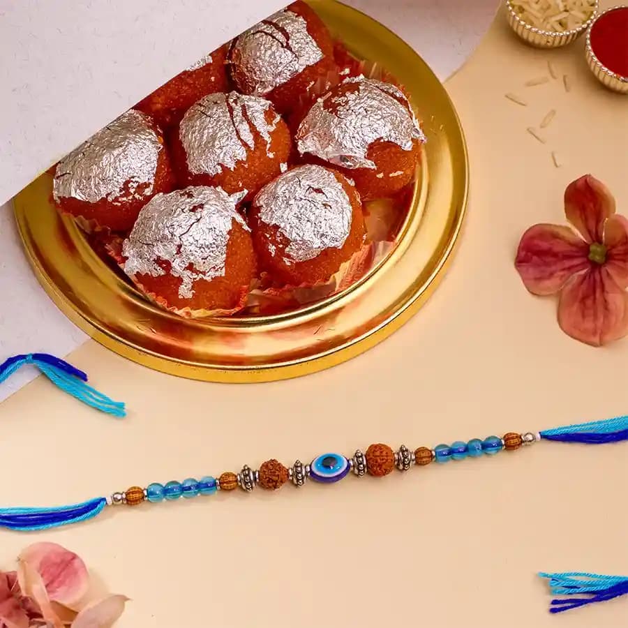 Sacred Evil Eye Rakhi N Ghee Laddu Festival Combo