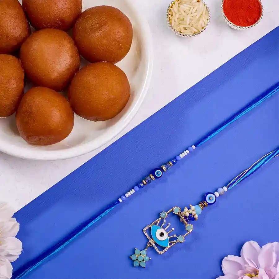 Fantastic Evil Eye Bhaiya Bhabhi Rakhi N Gulab Jamun Combo