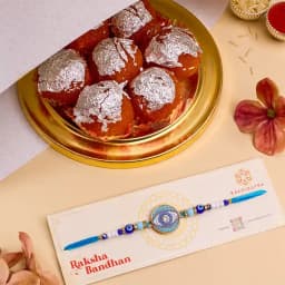 Trendy Evil Eye Rakhi N Ghee Laddu Combo 1
