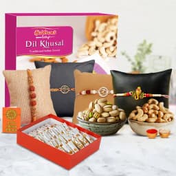 Remarkable Set of 4 Rakhis with Haldiram Sweets N Assorted Dry Fruits 1