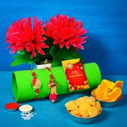Arresting Bhaiya Bhabhi Rakhi Set with Dried Mango N Pineapple 1