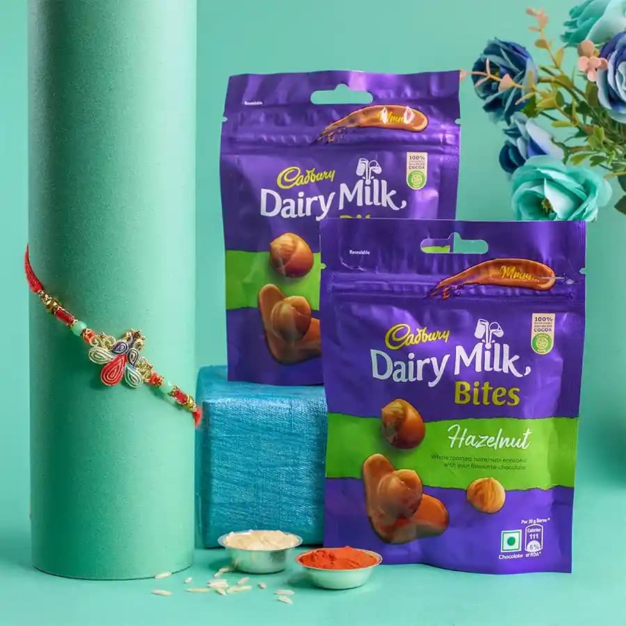 Beautiful Peacock Rakhi N Cadbury Hazelnut Bites Combo