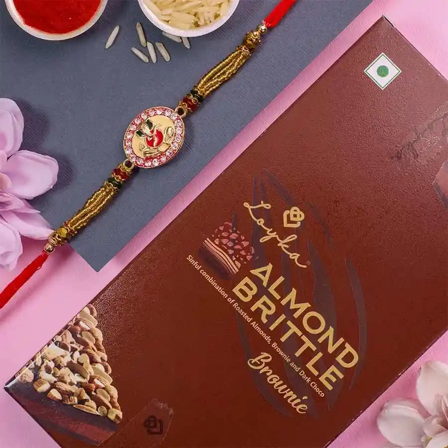 Stylish Ganesh Rakhi N Loyka Almond Brittle Brownie Combo