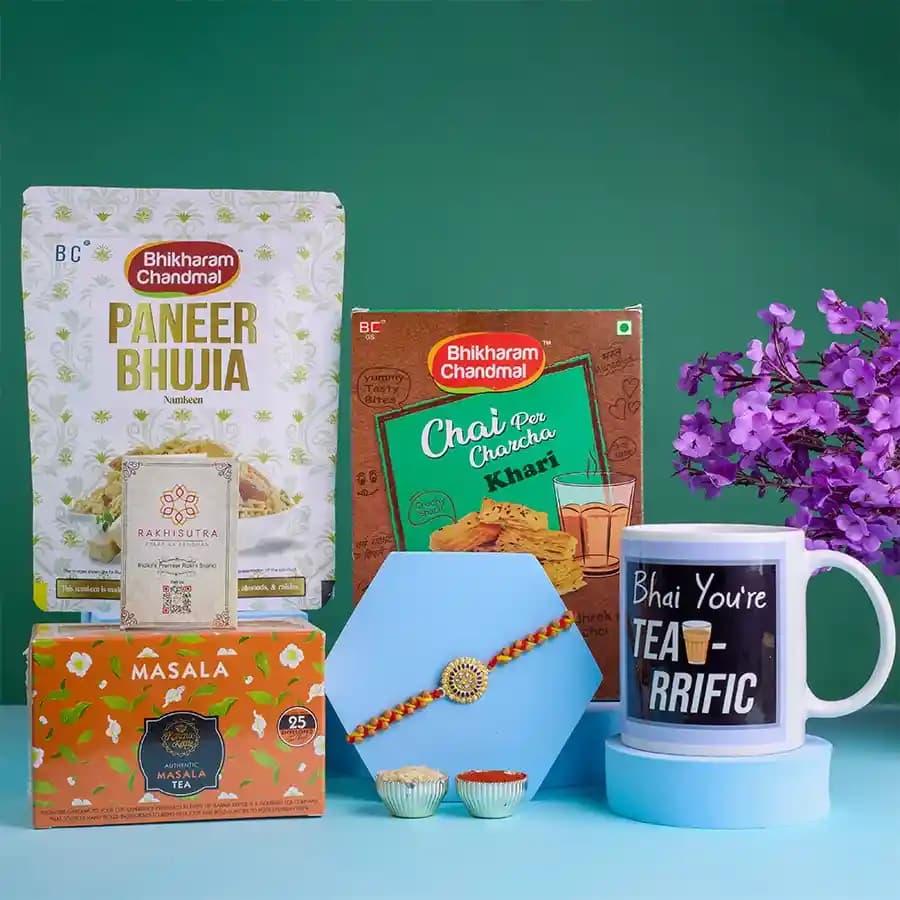 Elegant Kundan Rakhi N Treats Hamper
