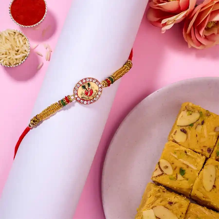Ganesha Kundan Rakhi N Soan Papdi Gift Pack