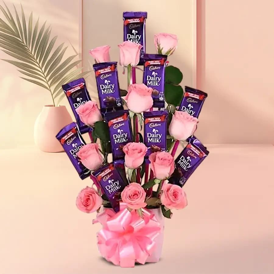 Marvelous Arrangement of Roses with Cadbury Dairy Milk Chocolates