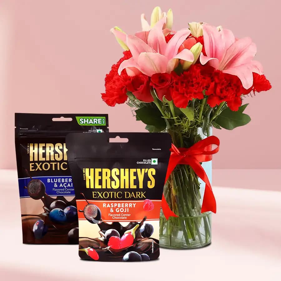 Lovely Mixed Flowers in Glass Vase with Hersheys Exotics