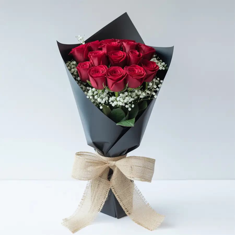 Beautiful Red Roses Bouquet in Black Tissue Wrap